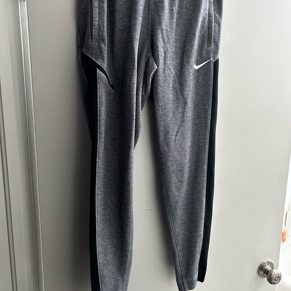 grey medium nike sweatpants joggers small stain on front